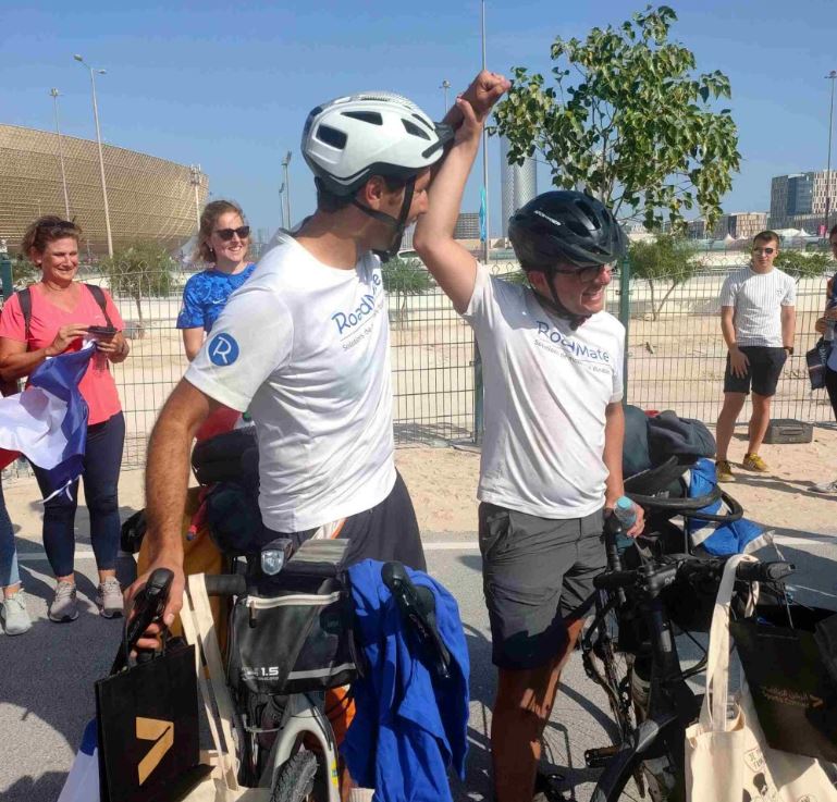 After three-month bicycle journey, two French football fans arrive Doha