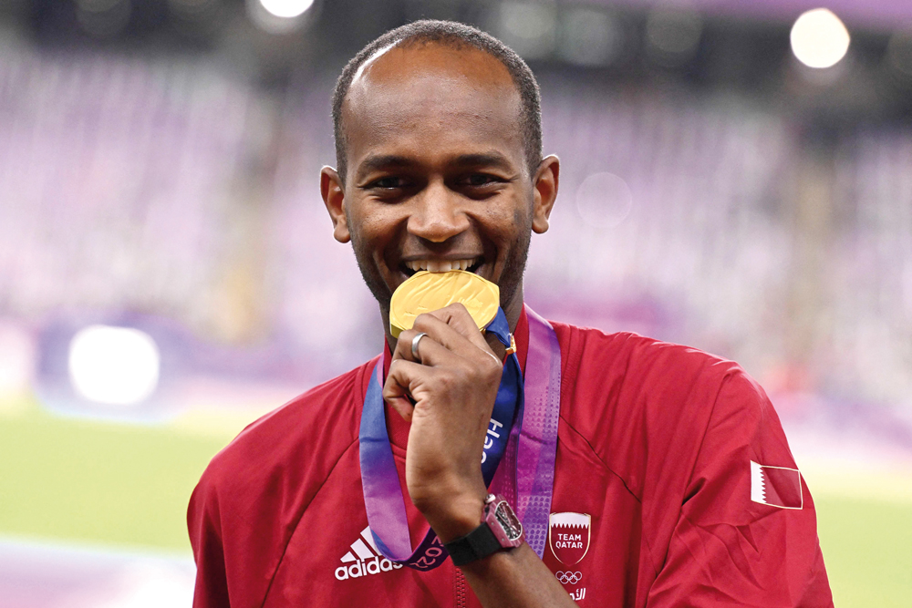 Barshim equals own record to lead Qatar’s medal rush