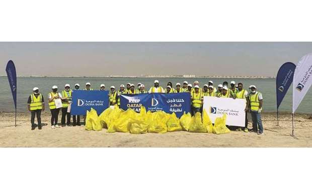 Doha Bank participates in beach cleanup