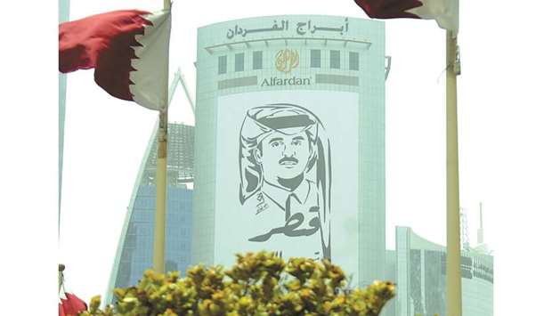 Emirقs portrait adorns Alfardan Towers