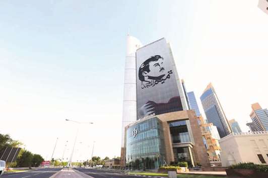 قTamim Al Majdق mural installed at Commercial Bank Plaza building