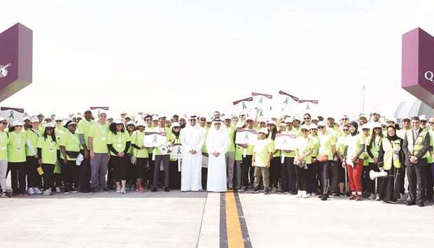 Qatar Airways staff walk down HIA runway to promote good mental health