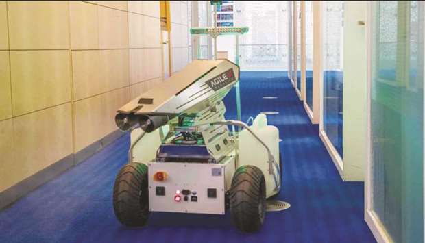 QF student develops a dual-role robot for people's safety during Covid-19