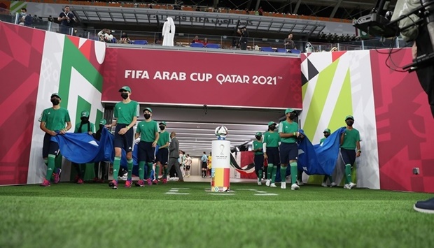 QF youth serve as flag bearers during the FIFA Arab Cup 2021