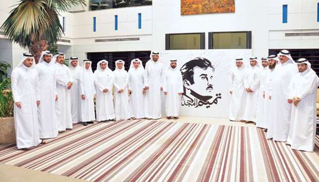 QIB unveils قTamim Al Majdق  murals across several branches