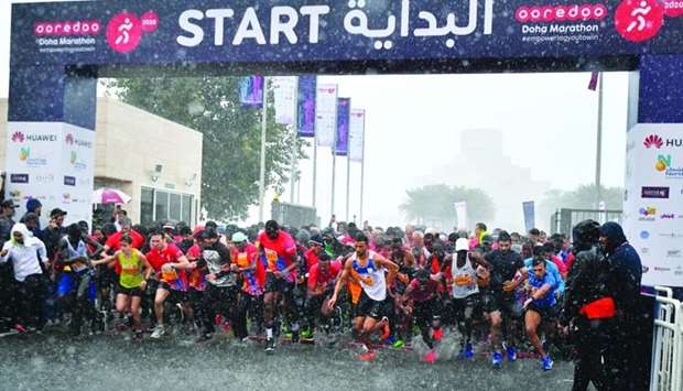 Thousands participate Ooredoo Doha Marathon joined by rains