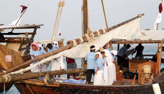 Traditional fishing competition for children at Katara beach